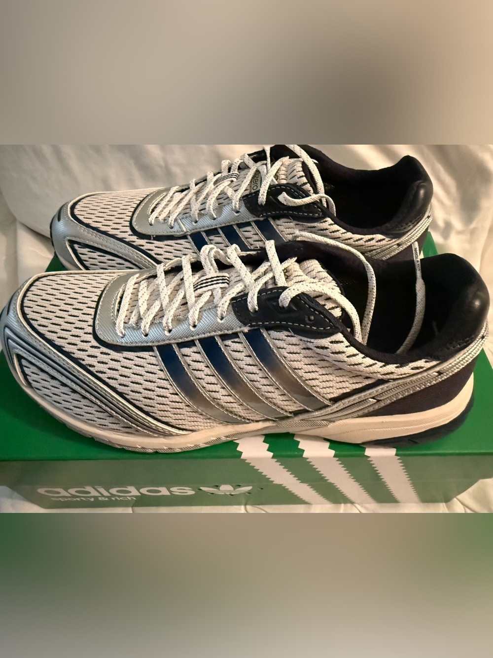 adidas W’s Sporty & Rich Adizero Adios rubber and leather-trimmed mesh sneaker